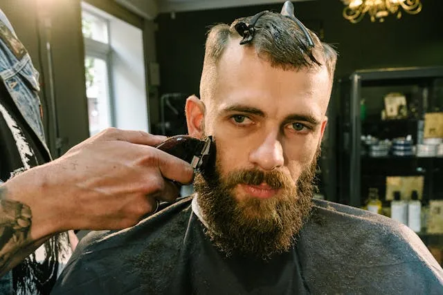 Personal and miscellaneous services invoice templates: a barber trimming a beard